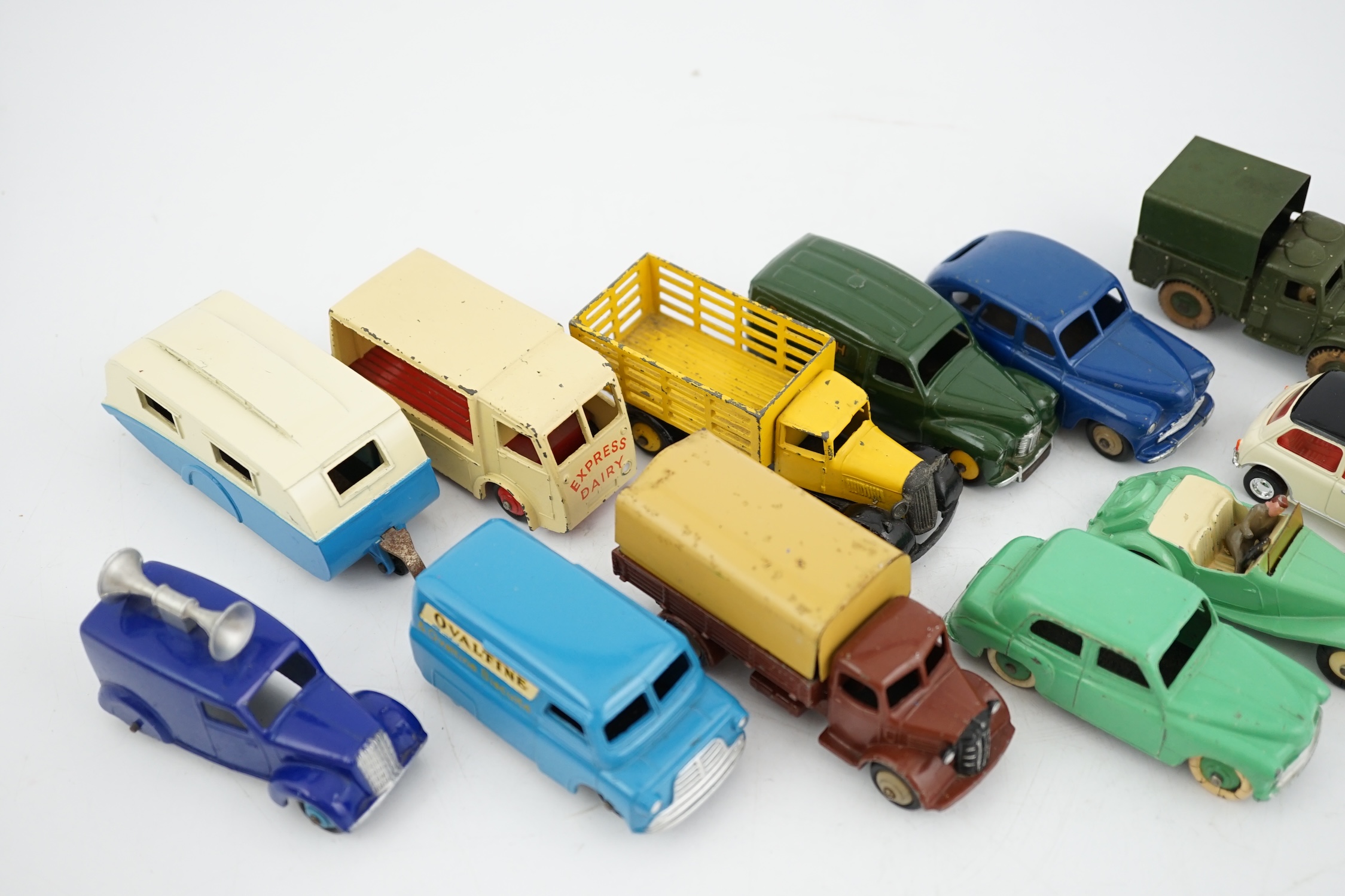 Twelve Dinky Toys, including; Austin van, Vanguard, Market Gardener’s wagon, Hillman Minx, MG Midget, Bedford van, etc.